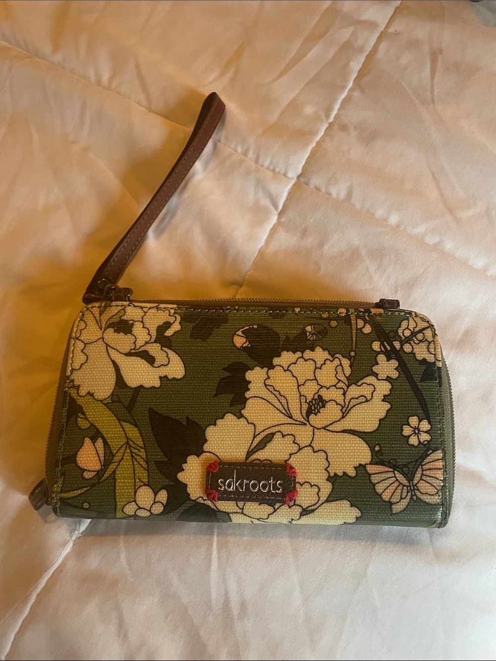 Sakroots Olive Floral Wristlet with Cream.